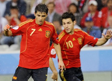 David Villa dan Cecs Fabregas saat memperkuat timnas Spanyol.