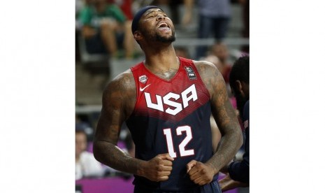 DeMarcus Cousins of the U.S. celebrates his team's victory over Slovenia at the end of their Basketball World Cup quarter-final game in Barcelona September 9, 2014.