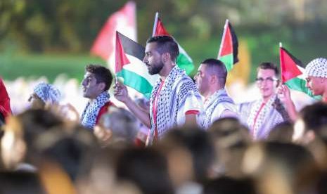 Palestinian athletes marches in the opening ceremony of Asian Games 2018 at Gelora Bung Karno Main Stadium, Senayan, Jakarta, Saturday (August 18).