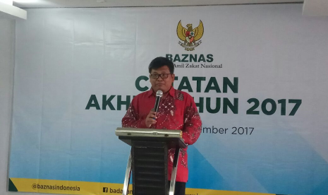 Deputi Baznas, Arifin Purwakananta sedang menjelaskan pencapaian Baznas selama tahun 2017.