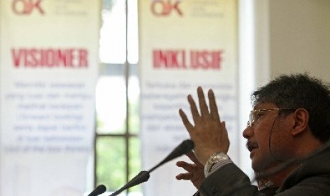 Deputi Komisioner OJK Mulya Siregar saat memberikan paparan.