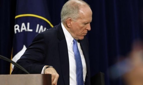 Director of the Central Intelligence Agency (CIA) John Brennan walks away after holding a rare news conference at CIA Headquarters in Virginia, December 11, 2014.