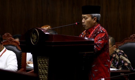 Direktur Jenderal Penyelenggara Haji dan Umrah Nizar Ali memberikan keterangan saat sidang uji materi Undang-undang Pengelolaan Keuangan Haji di Mahkamah Konstitusi, Jakarta, Selasa (26/9). 