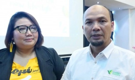 Direktur Mobilisasi ZIS Dompet Dhuafa, Yuli Pujihardi (Kanan) dan CEO Hepi.inc, Agnes Aprilia (Kiri) 