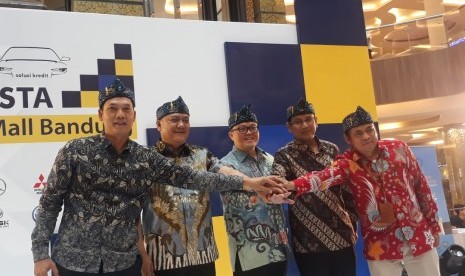   Direktur Penjualan dan Distribusi PT Mandiri Tunas Finance (MTF) Harjanto Tjitohardjojo saat membuka MTF Autofiesta Bandung 2019, Selasa (15/10). MTF Autofiesta, diselenggarakan di Trans Studio Mall pada 14-20 Oktober 2019.