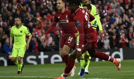 Divock Origi, penyerang Liverpool, membobol gawang Barcelona FC dalam pertandingan babak pertama leg kedua semifinal Liga Champions di Stadion Anfield, Liverpool, 7 Mei 2019. (kredit: EPA)