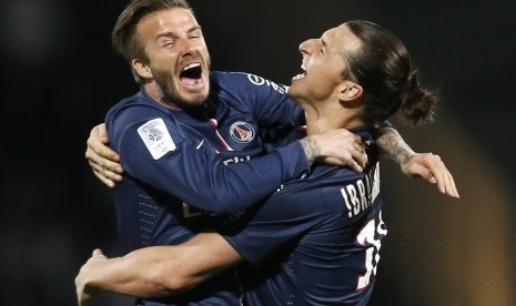 David Beckham (kiri) saat bermain untuk Paris Saint-Germain pada 2013.