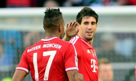 Dua penggawa Bayern Muenchen, Jerome Boateng (kiri) dan Javi Martinez.