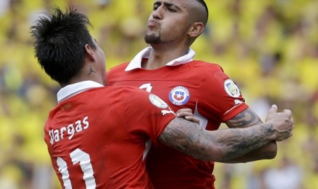 Eduardo Vargas dan Arturo Vidal.