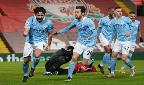 Ekspresi Gelandang Manchester City, Ilkay Gundogan usai mencetak gol ke gawang Liverpool.