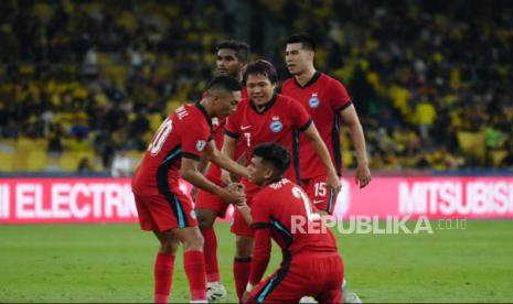 Ekspresi kebahagiaan pemain Singapura setelah menahan imbang Malaysia 0-0 untuk lolos ke semifinal Piala AFF 2024.