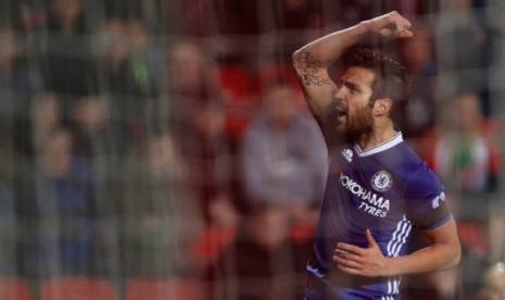 Ekspresi kegembiraan Cesc Fabregas setelah membobol gawang Sunderland.