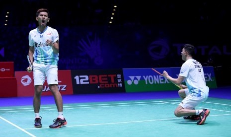 Ekspresi kegembiraan Fajar Alfian (kanan)/Muhammad Rian Ardianto lolos ke semifinal ganda putra All England 2019.