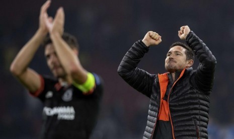 Ekspresi kegembiraan Frank Lampard (kanan)usai kemenangan Chelsea atas Ajax di Liga Champions.