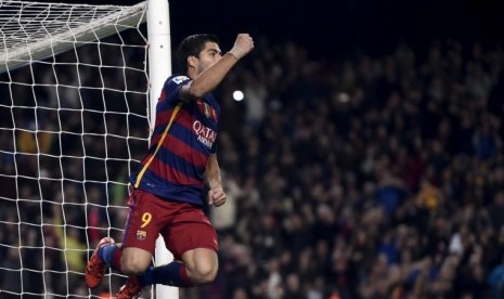 Ekspresi Luis Suarez usai menjebol gawang Real Betis.