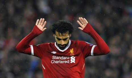 Ekspresi Mohamed Salah seusai menjebol gawang AS Roma.