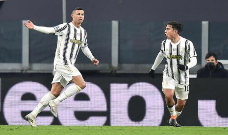 Ekspresi penyerang Juventus Cristiano Ronaldo (kiri) seusai menjebol gawang Udinese.