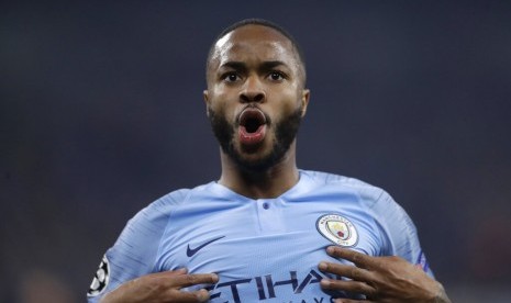 Ekspresi penyerang Manchester City Raheem Sterling setelah menjebol gawang Schalke.