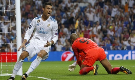 Ekspresi penyerang Real Madrid Cristiano Ronaldo seusai menjebol gawang APOEL pada pertandingan Grup H Liga Champions di Santiago Bernabeu, Kamis (14/9) dini hari WIB.