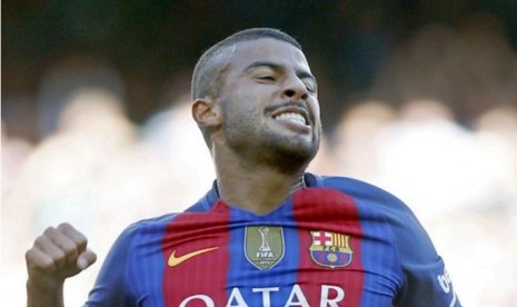 Ekspresi Rafinha seusai membobol gawang Deportivo La Coruna, Sabtu (15/10).