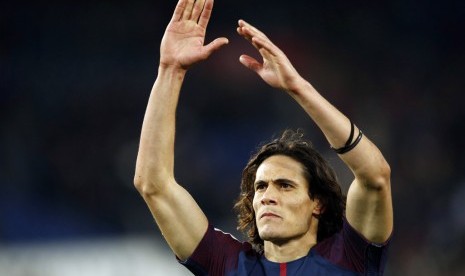 Ekspresi striker PSG, Edinson Cavani seusai laga Ligue 1 lawan Montpellier di Parc des Princes, Sabtu (27/1). PSG menang 4-0 pada laga ini.