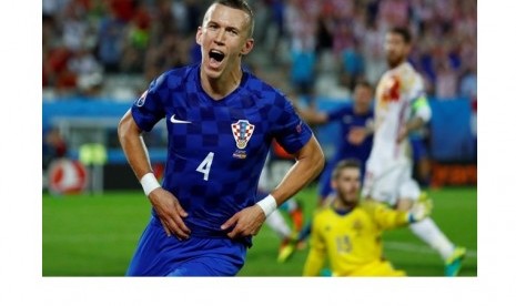 Ekspresi winger Kroasia Ivan Perisic seusai menciptakan gol kemenangan timnya atas Spanyol.