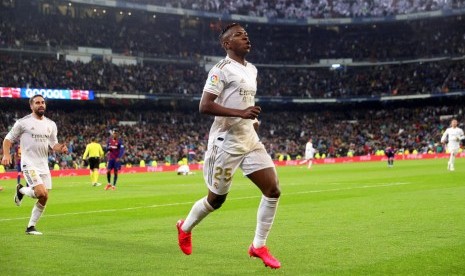 Ekspresi winger Real Madrid Vinicius Junior usai menjebol gawang Barcelona pada duel El Clasico.