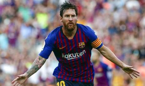 elebrasi gol Lionel Messi ke gawang Huesca. 