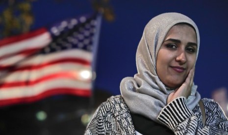 Enas Almadhwahi, organizer imigrasi untuk Arab American Association of New York berharap Trump akan mengubah kata-katanya tentang Muslims.