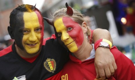 Fans Belgia bersiap menonton semi final Piala Dunia 2018.