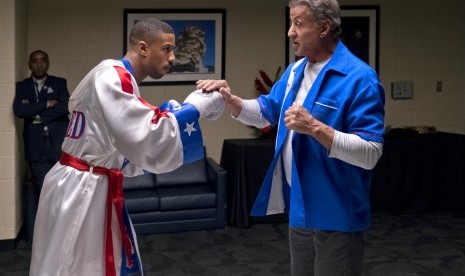 Aktor Sylvester Stallone (kanan) dalam film Creed II. Stallone tidak main di Creed III.