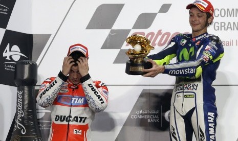 Valentino Rossi (kanan) dan Andrea Dovizioso.