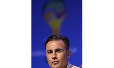 Former soccer great and World Cup winner Fabio Cannavaro of Italy answers a question during a press conference one day before the draw for the 2014 soccer World Cup in Costa do Sauipe near Salvador, Brazil, Thursday, Dec. 5, 2013.