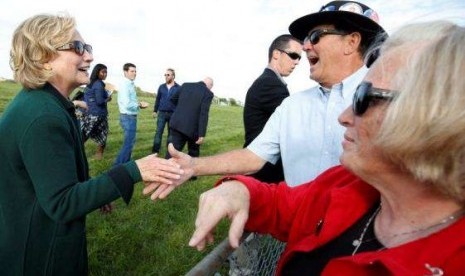 Former US Secretary of State Hillary Clinton greets supporters at the 37th Harkin Steak Fry in Indianola, Iowa September 14, 2014.