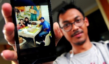 Foto Gayus Tambunan makan di restoran beredar di handphone masyarakat.