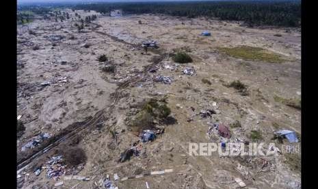 Foto udara suasana kerusakan akibat pencairan (likuefaksi) tanah yang terjadi di Desa Jono Oge, Sigi, Sulawesi Tengah, Kamis (4/10).