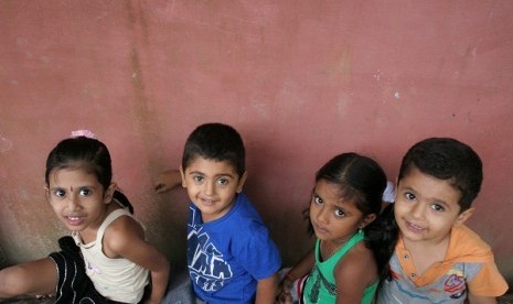 Four kids of Rohingnya refugees play in a shelter in Medan North Sumatra. (illustration)