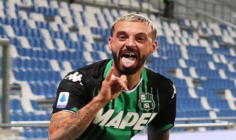 Francesco Caputo mencetak gol pada injury time untuk membawa Sassuolo menahan imbang Napoli 3-3.