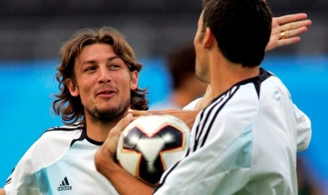 Gabriel Heinze (kiri).