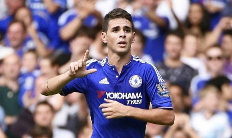 Oscar saat memperkuat Chelsea (ilustrasi) Oscar dilaporkan diminati Barcelona,.