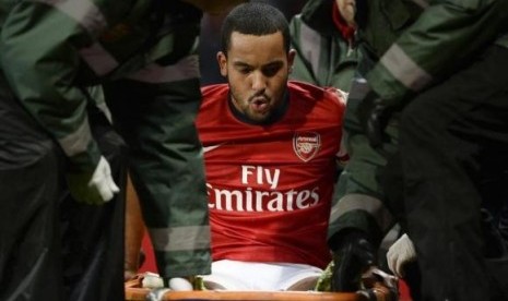 Gelandang Theo Walcott.