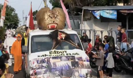  Gelaran selametan atau tasyakuran kampung yang diadakan di area Candi Badut oleh warga kelurahan Karang Besuki, kecamatan Sukun, Kota Malang, Jawa Timur pada Ahad (31/7)