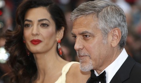 George Clooney dan istrinya, Amal Alamuddin.