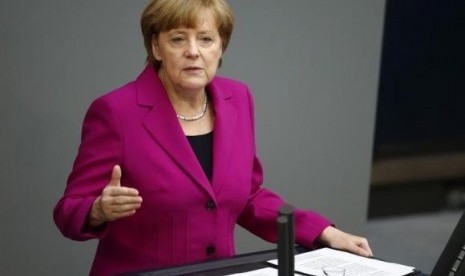 German Chancellor Angela Merkel addresses a session of the Bundestag, the lower house of Parliament, at the Reichstag in Berlin June 4 , 2014.