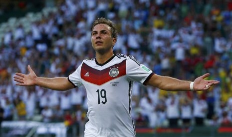 Germany's Mario Goetze celebrates after scoring against Ghana during their 2014 World Cup Group G soccer match at the Castelao arena in Fortaleza June 21, 2014.