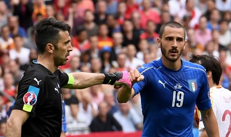 Gianluigi Buffon (kiri) dan Leonardo Bonucci.