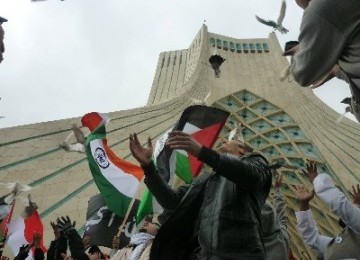 GMJ activists release white dove at Azadi National Monument, Tehran, Iran, last Saturday. This is a symbol of freedom of Palestine.  