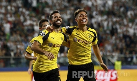 Pemain Dortmund merayakan gol di laga Liga Champions, Kamis (15/9).