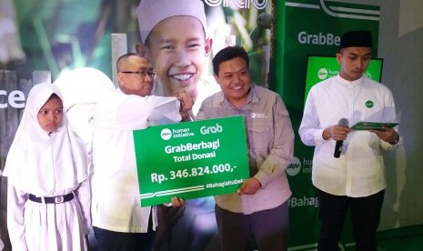 Grab dan PKPU Human Initiative bekerja sama dalam program GrabBerbagi untuk mendekatkan anak-anak yatim dengan kebahagiaan Hari Raya.