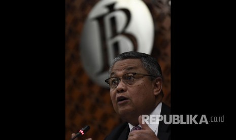 Gubernur Bank Indonesia Perry Warjiyo (ilustrasi). Rapat Dewan Gubernur (RDG) Bank Indonesia pada 15-16 Juli 2020 memutuskan untuk menurunkan suku bunga acuan BI 7-days Reverse Repo Rate (BI7DRR) menjadi sebesar empat persen.FOTO ANTARA/Puspa Perwitasari/ama. Fotografer :